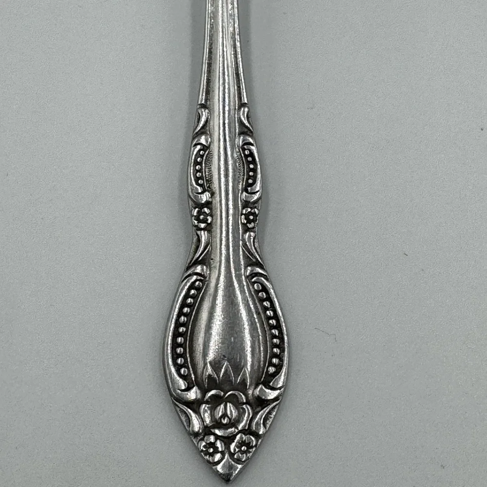 Vintage wan Rogers Stainless Spoon - Flowers‎